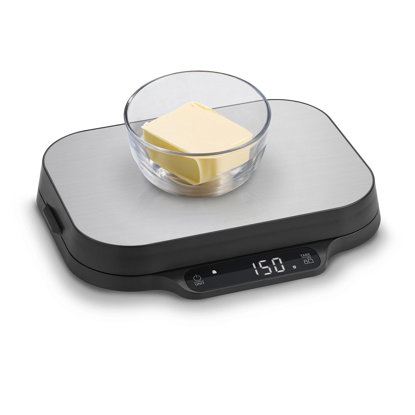 Scale with butter in a bowl, showing 150g, close-up shot