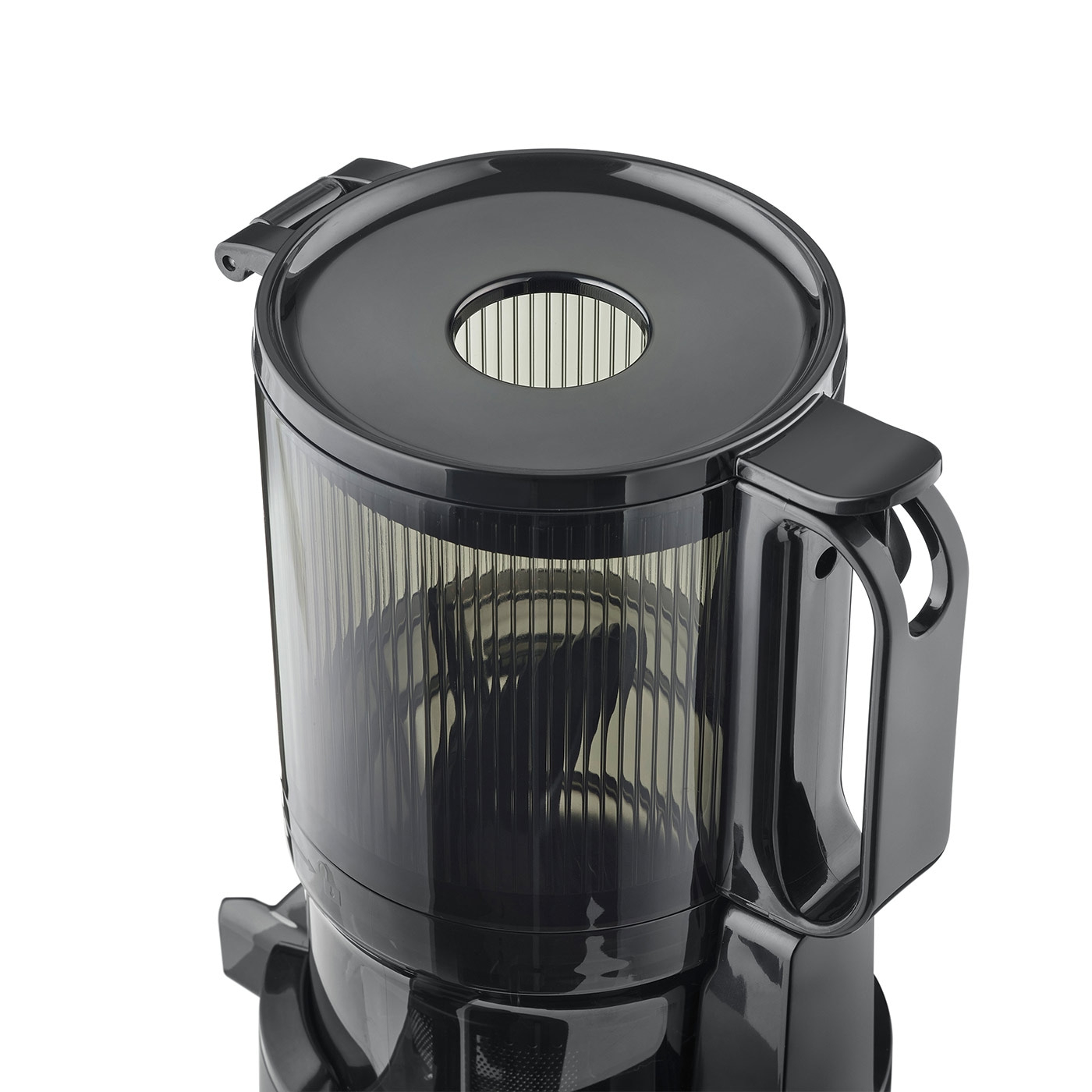 Black juicer with handle and lid, close-up shot, isolated on white background