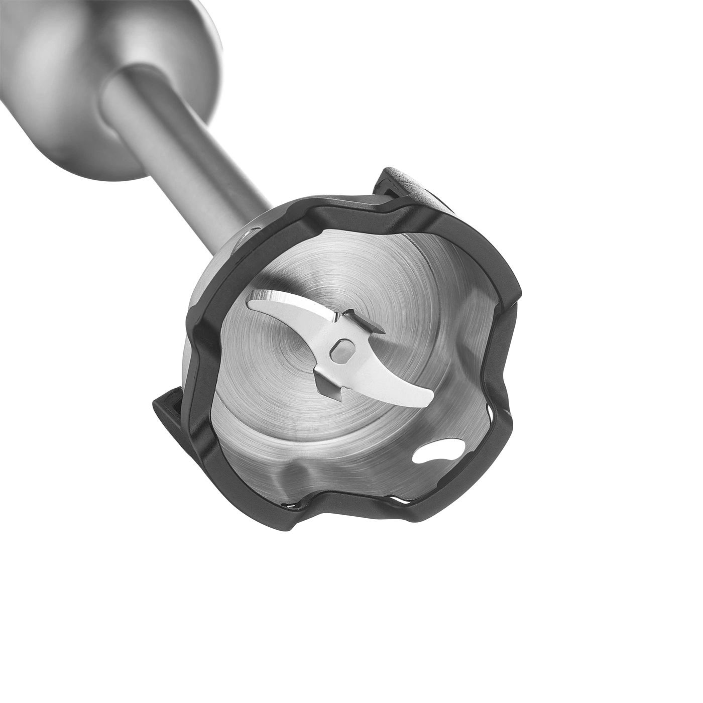 Close-up of a stick blender with blade and black plastic detail