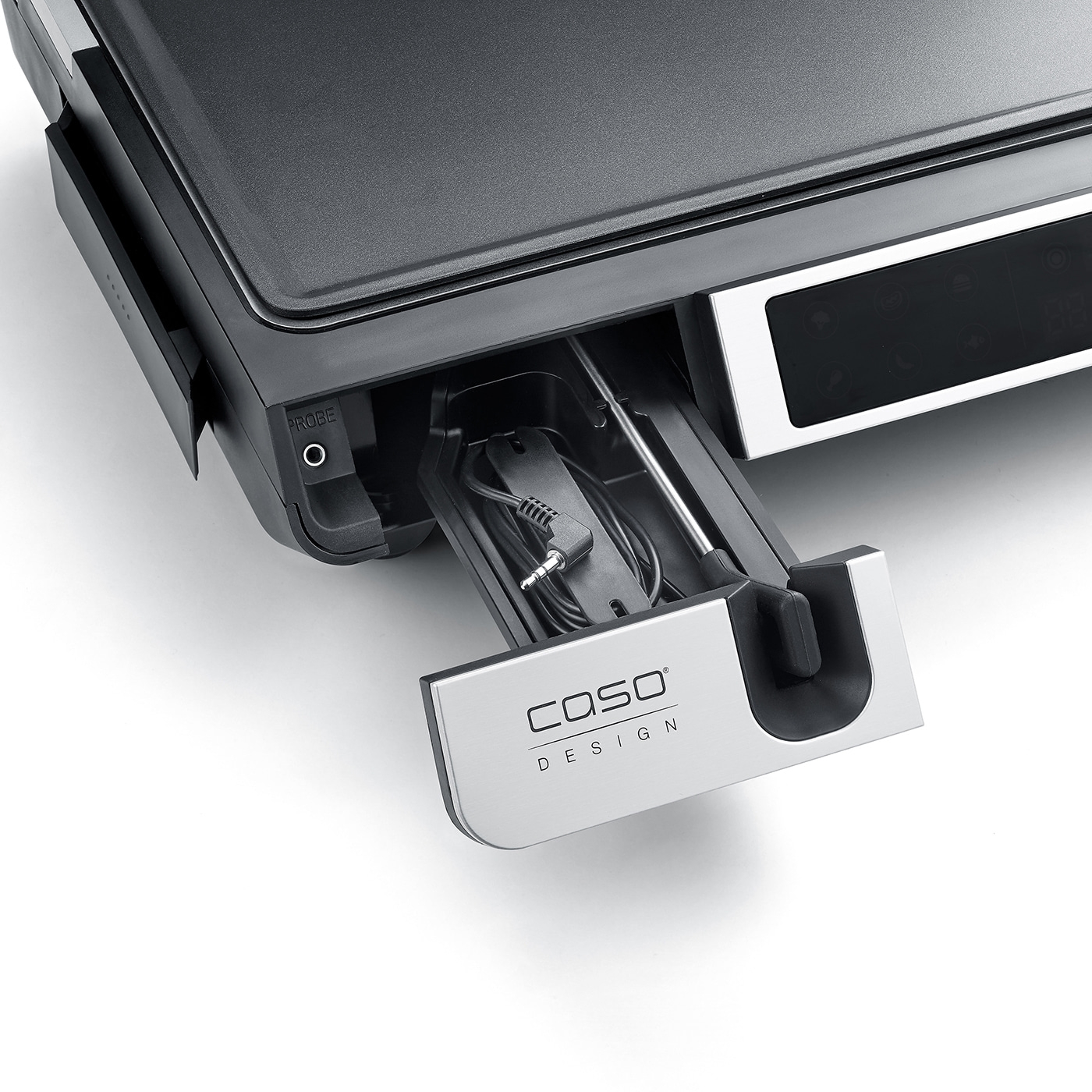 Grill with pull-out compartment, cable, and 'CASO DESIGN' logo.