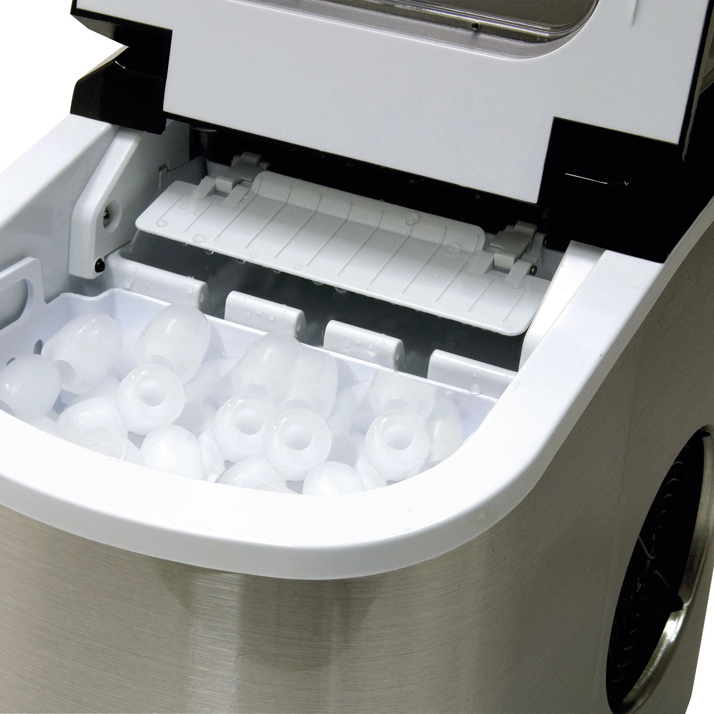 Ice machine with ice cubes, white and silver, close-up, open