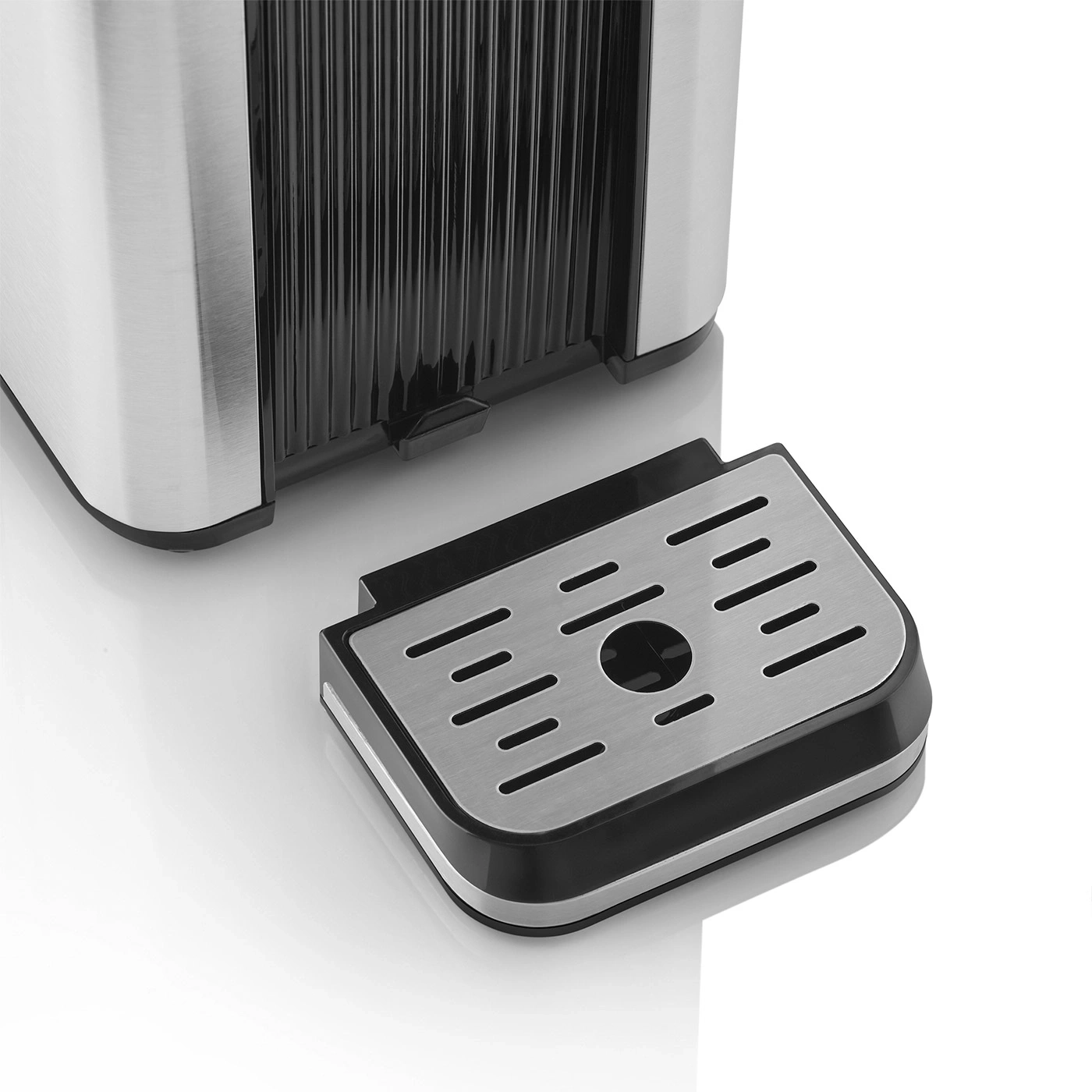 Coffee machine with removable drip tray, stainless steel and black, close-up