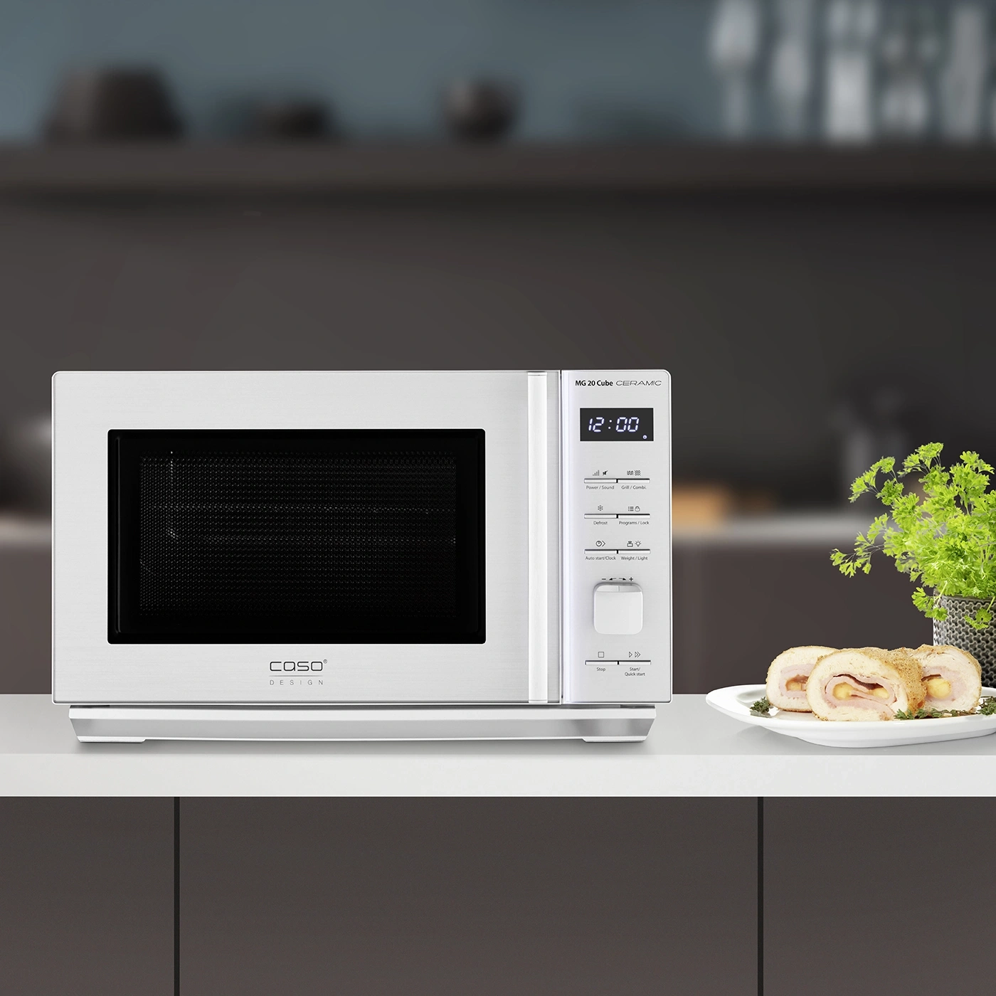 Microwave with food and plant on table, modern design, white color