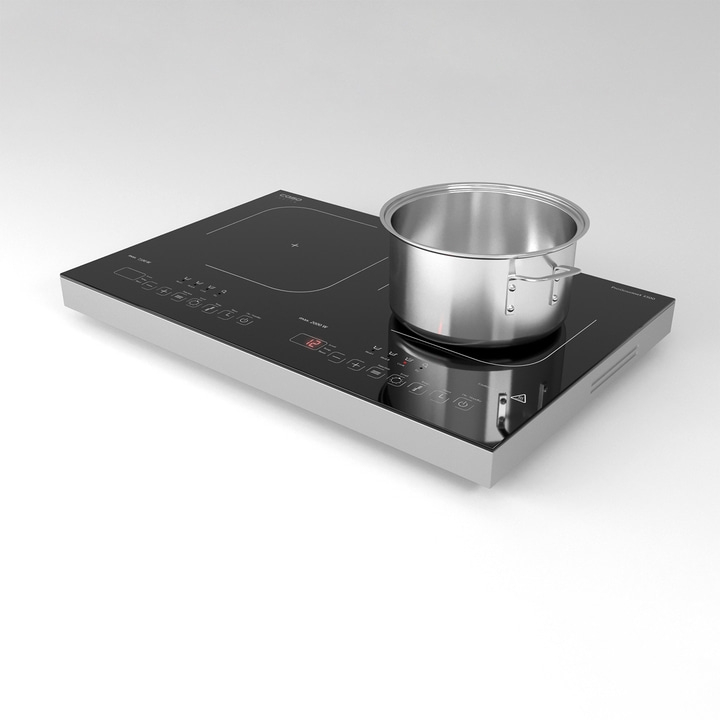 Induction cooktop with pot. Black surface, silver frame. Cooking made easy.