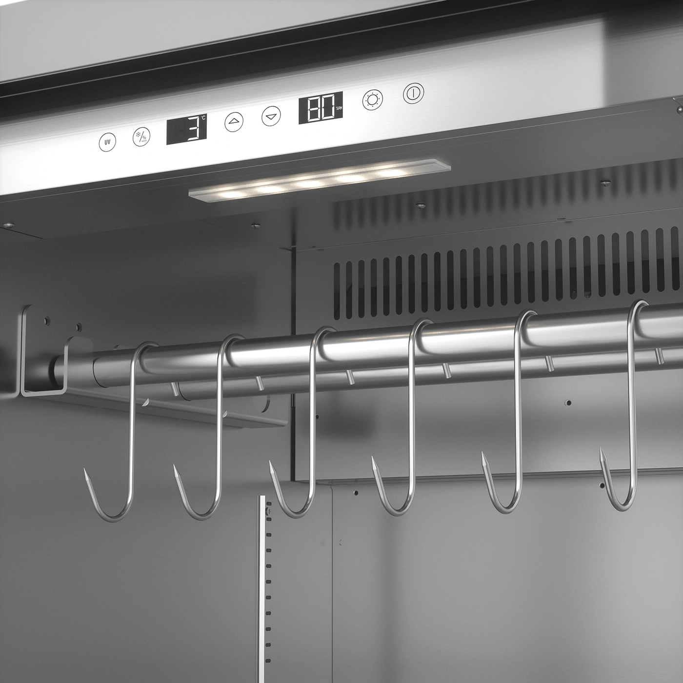 Refrigerator interior with hooks, temperature display, lighting, stainless steel