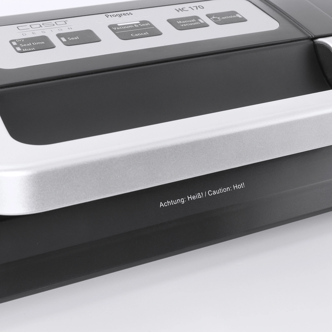 Vacuum sealer with control panel and warning: Achtung: Heiß! / Caution: Hot!
