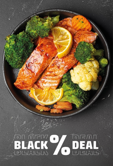 Salmon with vegetables and lemon on a plate, Black Deal promotion