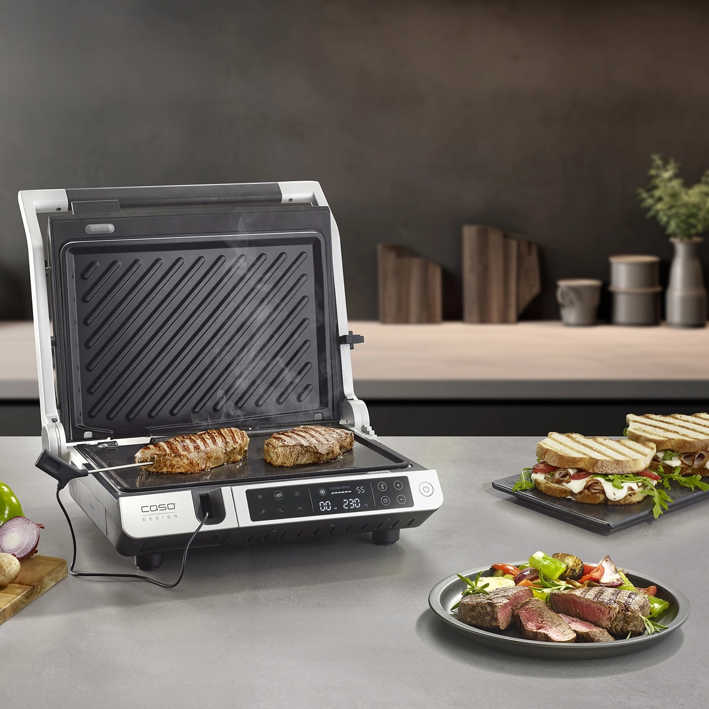Grill with meat and sandwiches on a table, preparing food.