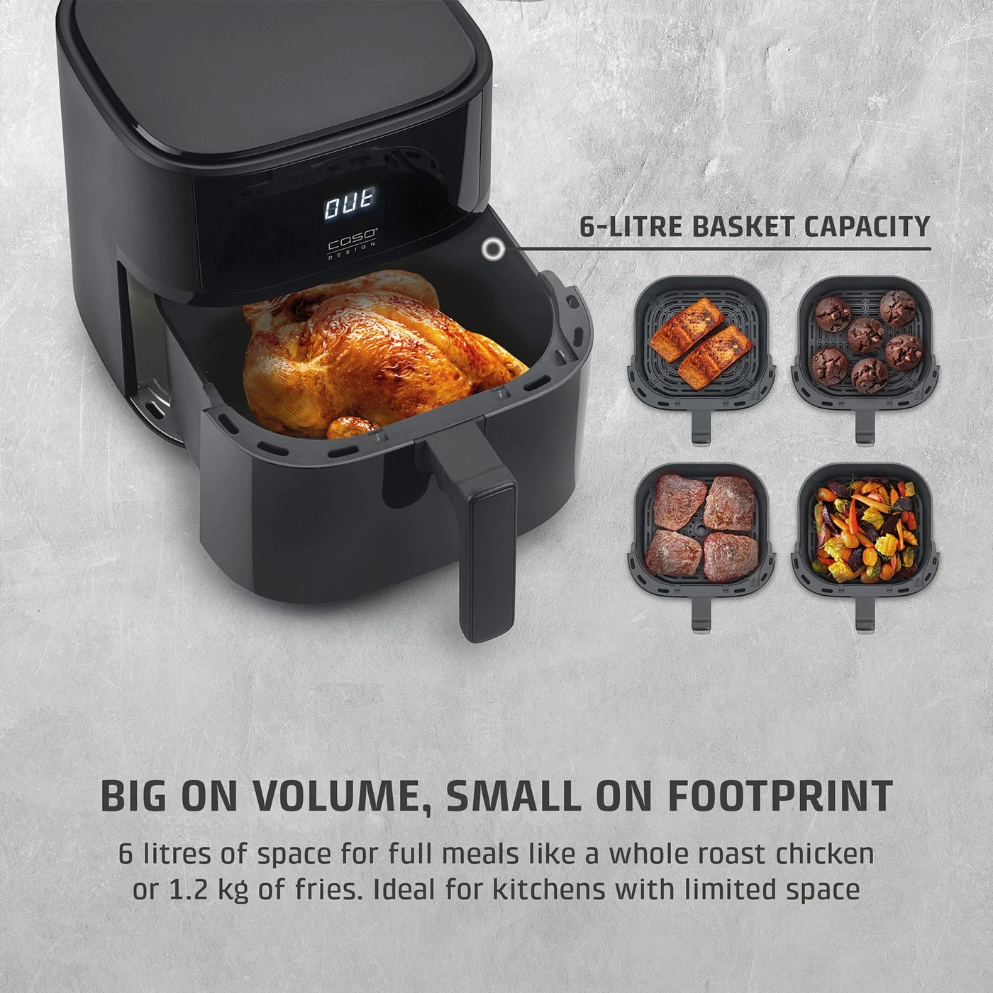 A black air fryer with a whole roast chicken and four baskets of food.
