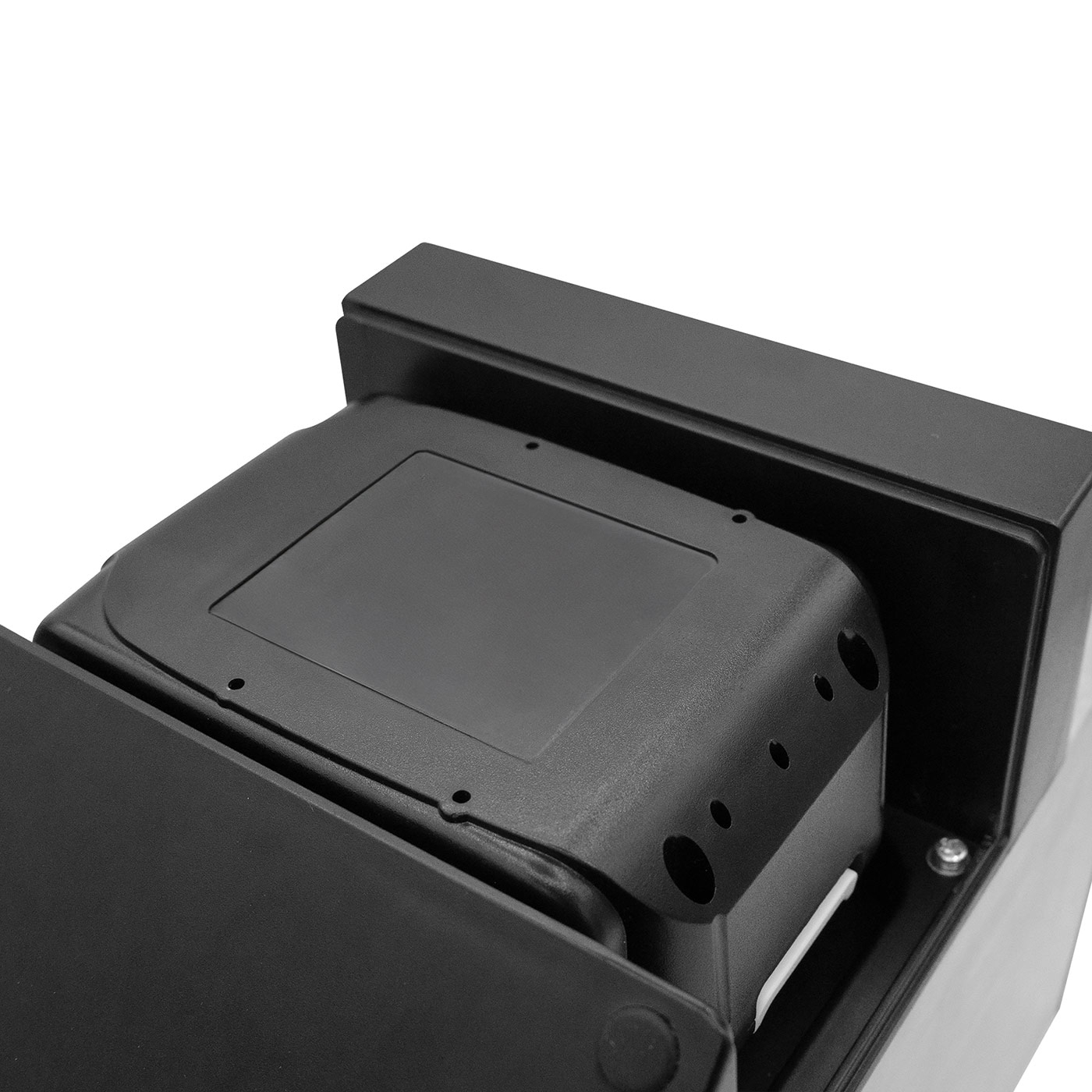 Black device with rectangular shape and holes, close-up detail