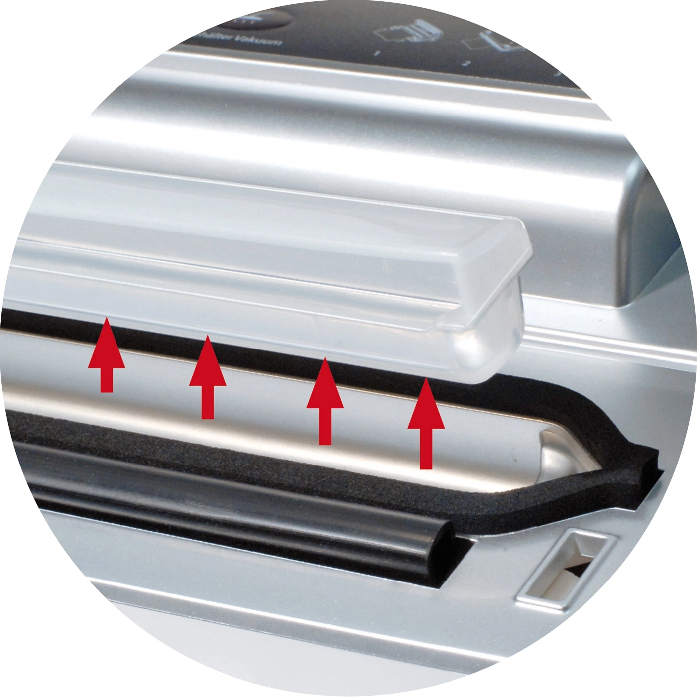 Close-up of a vacuum sealer with arrows pointing to the seal.