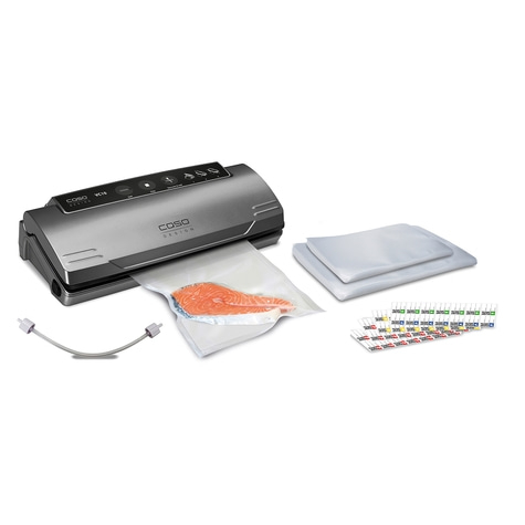 Vacuum sealer with accessories, fish fillet in bag, white background