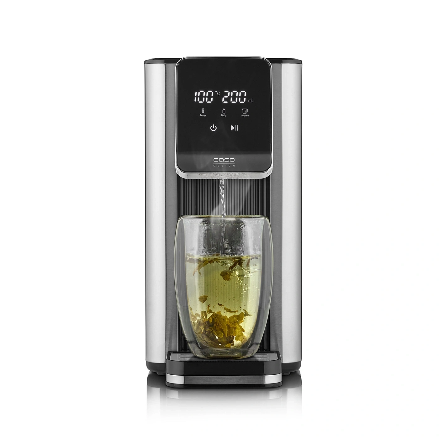 Stainless steel water boiler with glass cup, hot water pouring into cup, tea preparation