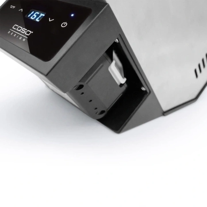 Close-up of a black device with digital display and temperature reading