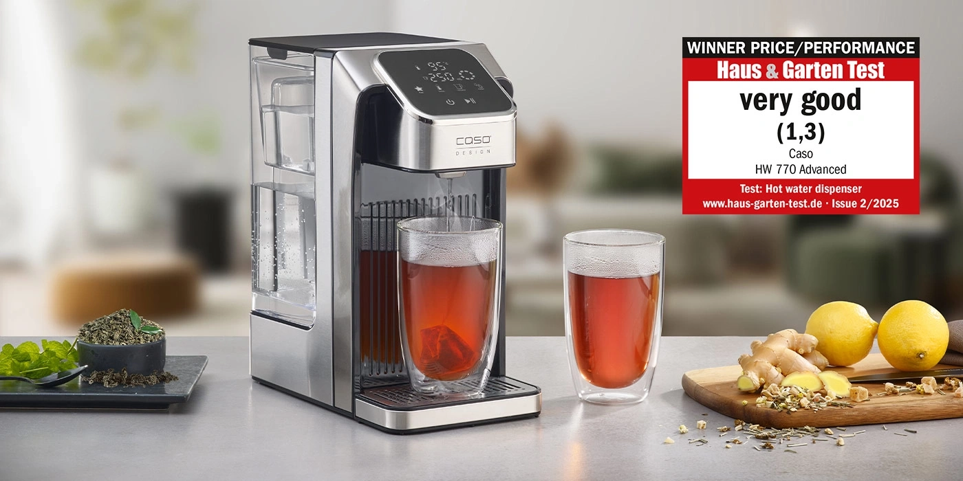 Hot water dispenser with 'very good' rating and accessories like tea and lemon.
