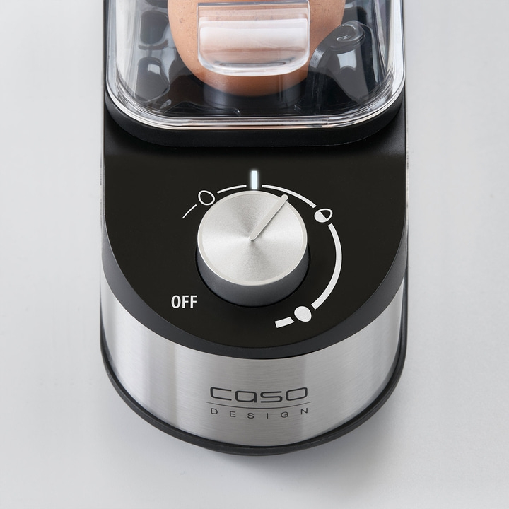 Close-up of an egg cooker with a dial and an OFF marking on it.