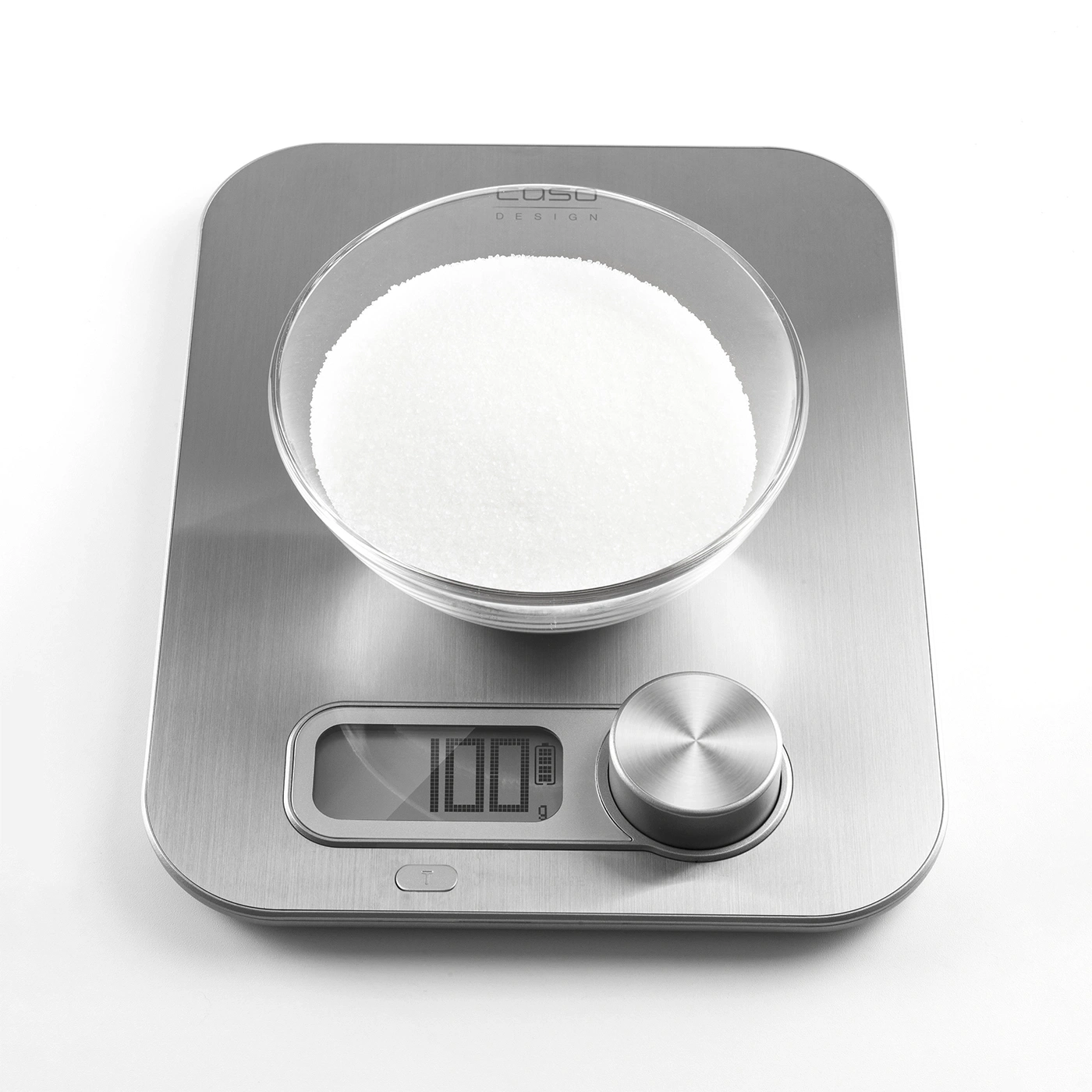 Scale with sugar in glass bowl, showing 100g, Caso design, stainless steel