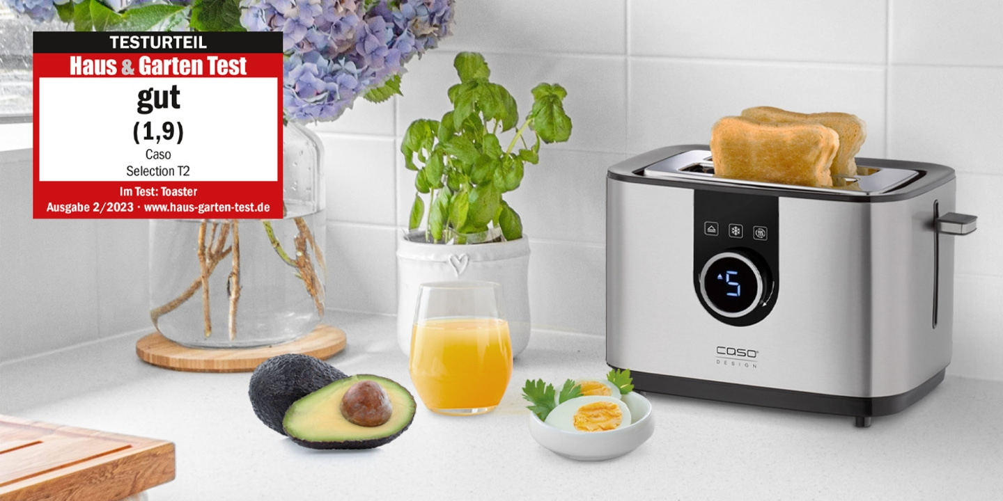 Toaster mit Toast, Avocado, Ei, Saft und Bewertung 'gut' von Haus & Garten Test.