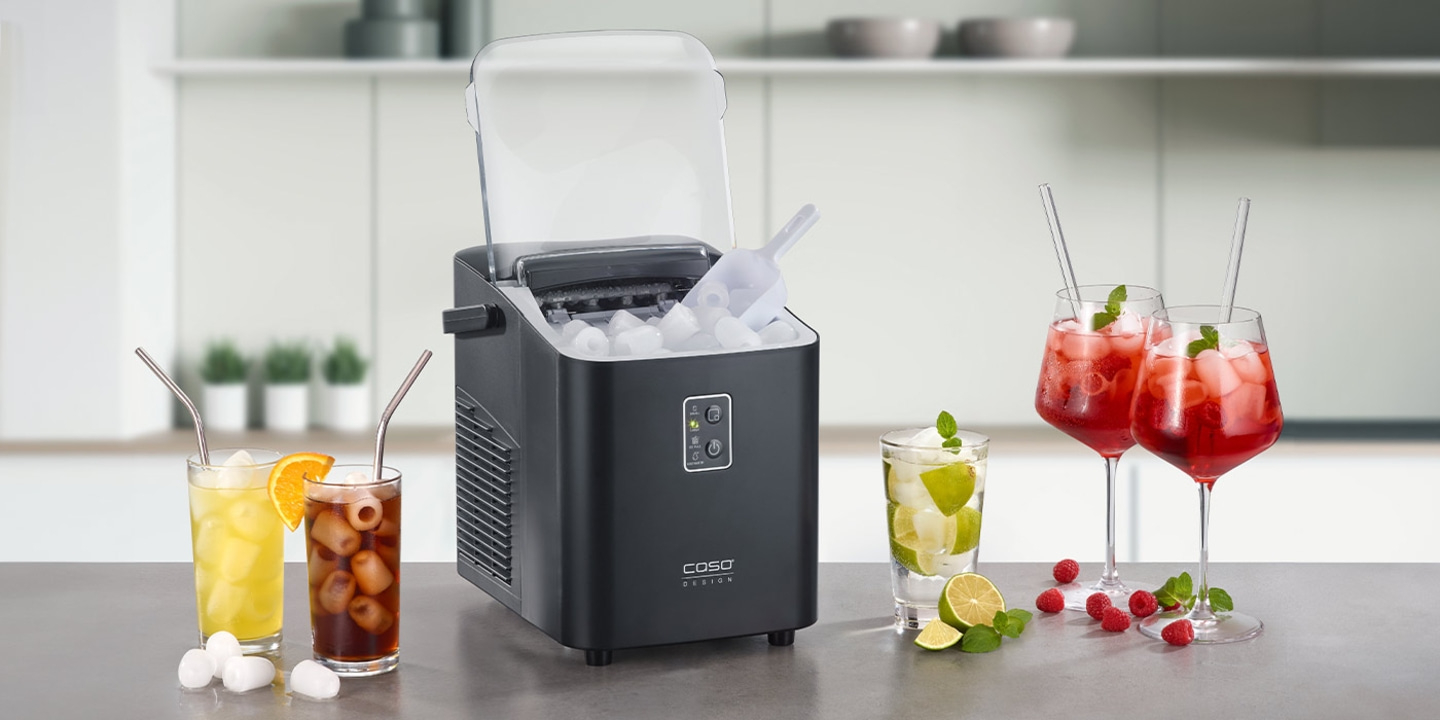 Ice machine with drinks and ice cubes on a countertop