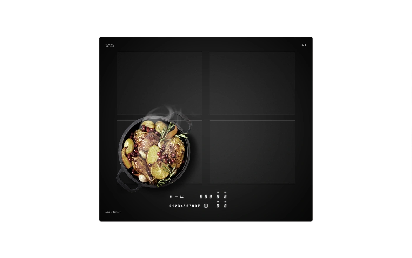 Black induction hob with four zones and a pot of food