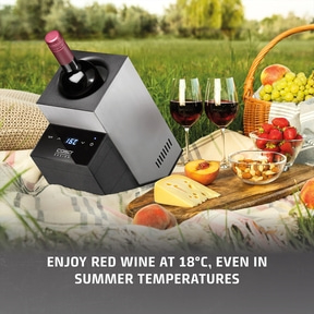Outdoor wine cooler with picnic accessories and text. Enjoy red wine at 18°C. Perfect for summer.