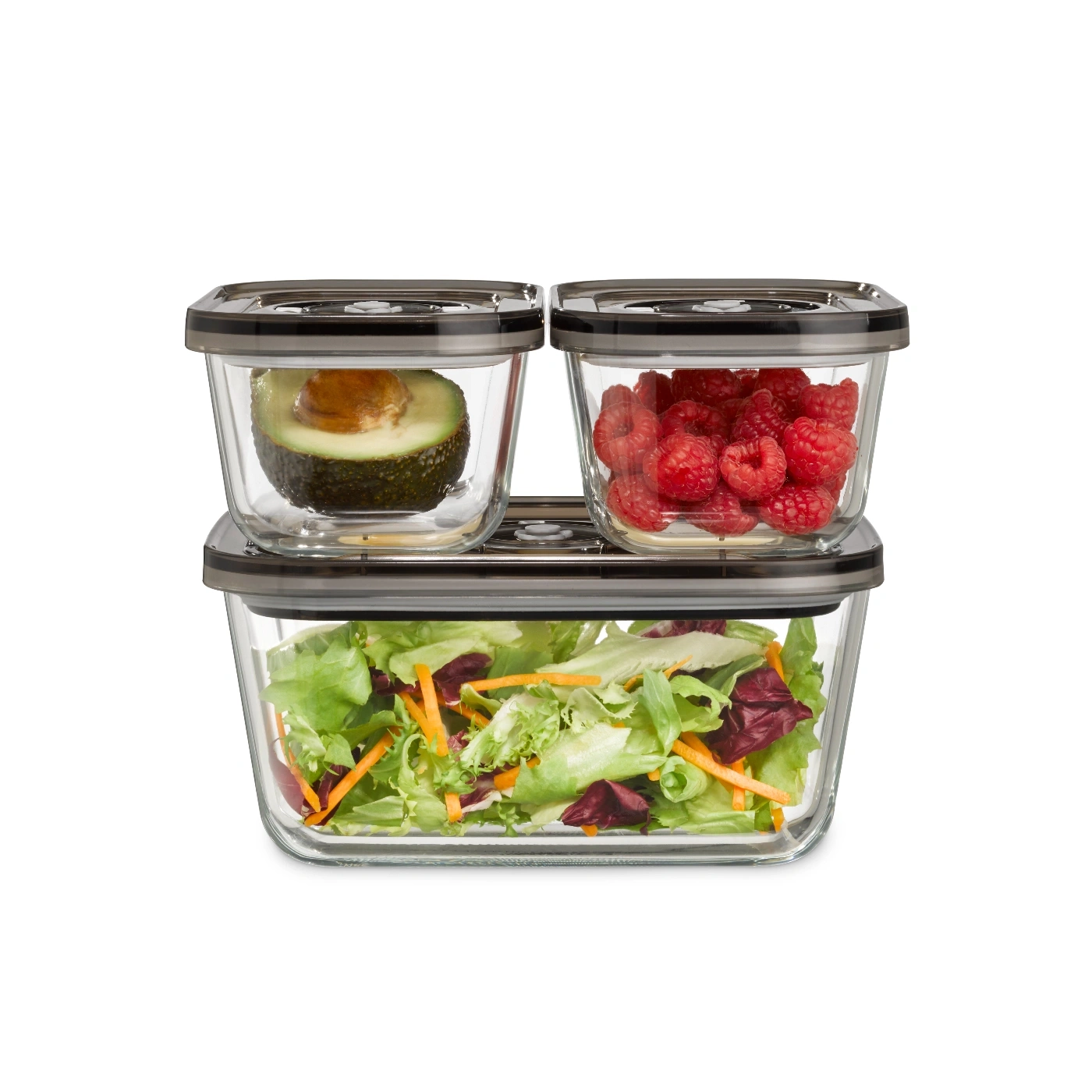 Three glass containers with avocado, raspberries, and salad on a white background.