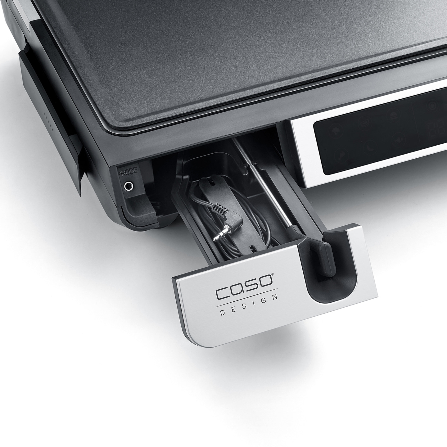 Grill with pull-out compartment, cable, and 'CASO DESIGN' logo.