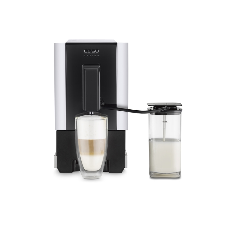 Coffee machine with milk frother and glass with latte macchiato