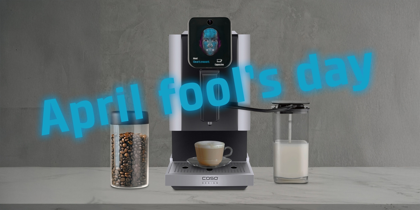 Coffee machine with "April fools day" text, coffee, and milk