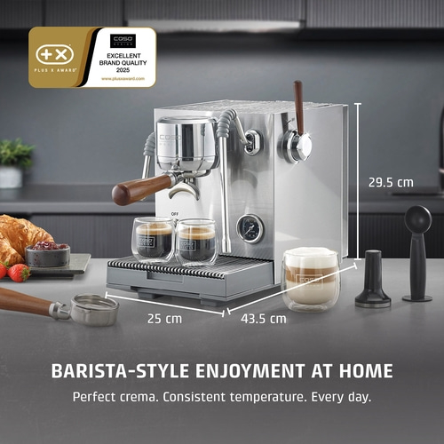 A stainless steel espresso machine with wood accents and two glasses of espresso, next to a latte macchiato. Dimensions are shown.