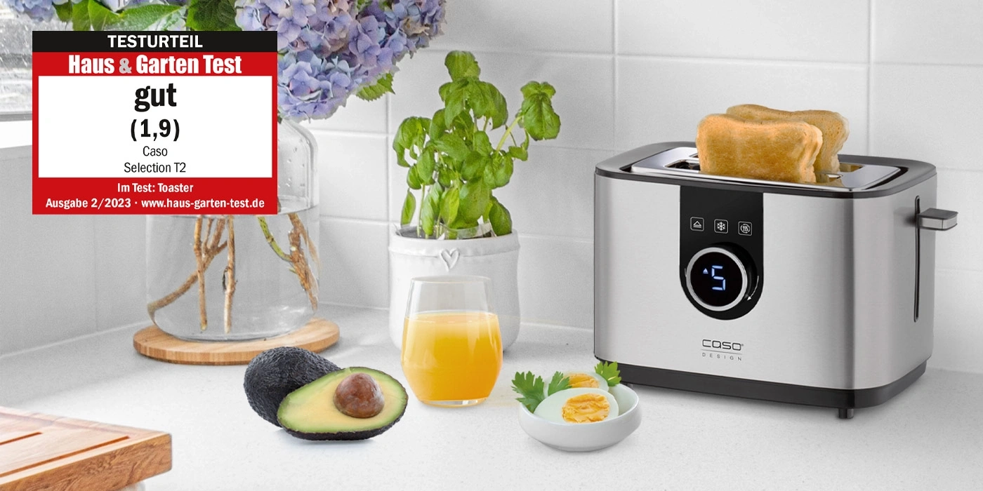 Toaster mit Toast, Avocado, Ei, Saft und Bewertung 'gut' von Haus & Garten Test.