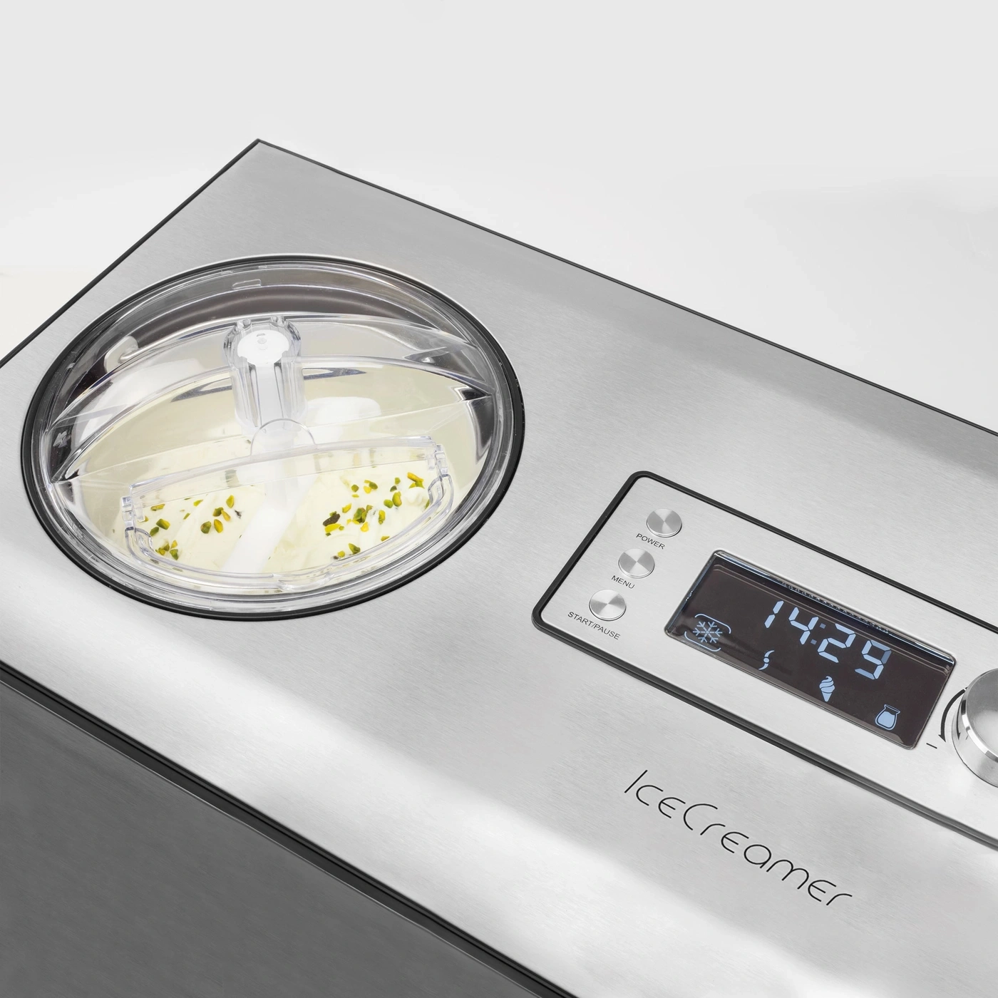 Ice cream machine with ice cream, display, and control buttons on the panel