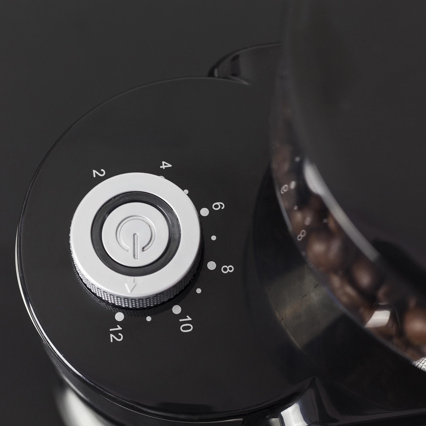 Coffee machine with a dial and numbers indicating the settings.