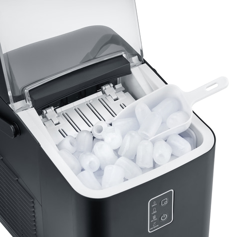 Ice maker with ice cubes and scoop, ready to serve and make drinks.