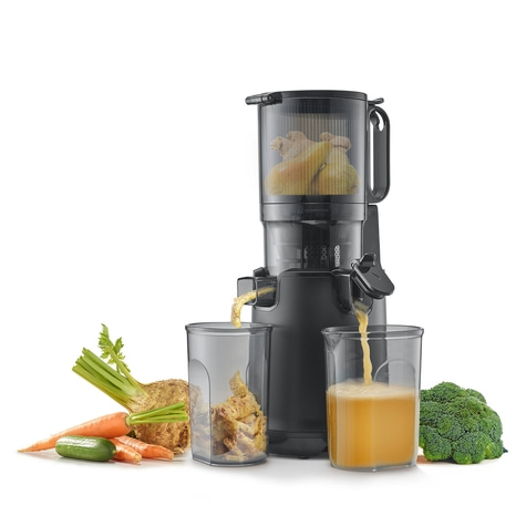 Black juicer with vegetables and juice in glasses, isolated on white background