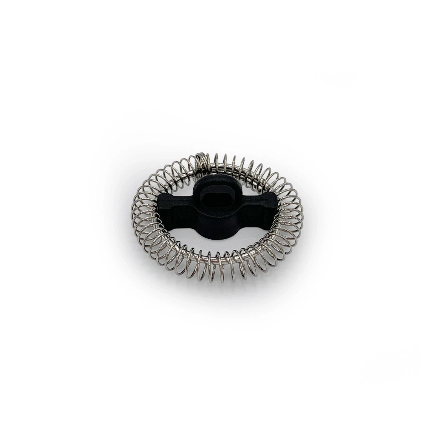 Black milk frother with metal spiral on white background