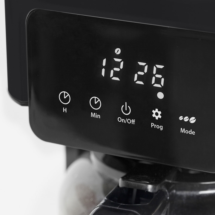Coffee machine with digital display showing 12:26, buttons for various functions.