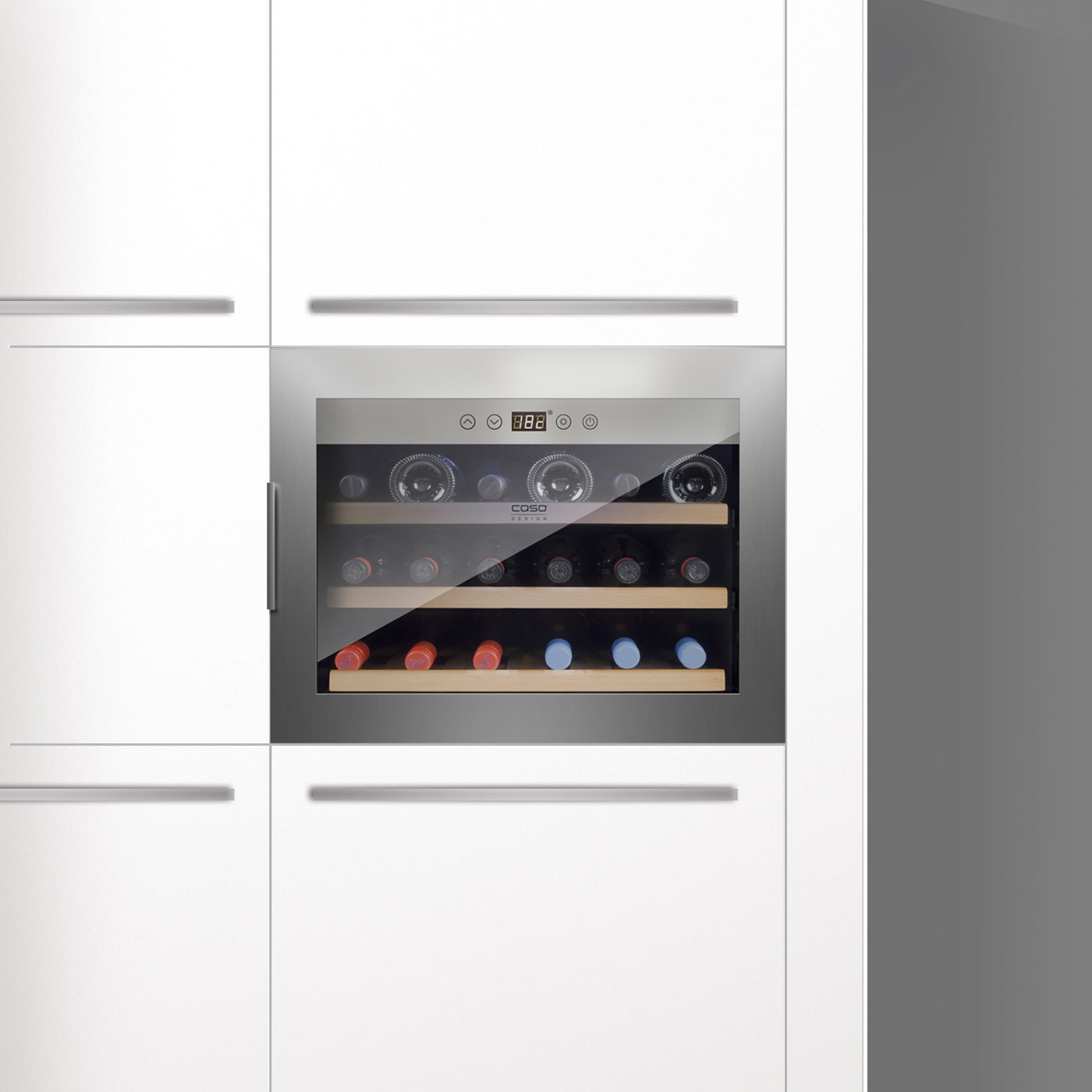Wine cooler in white kitchen, built-in, with bottles and display