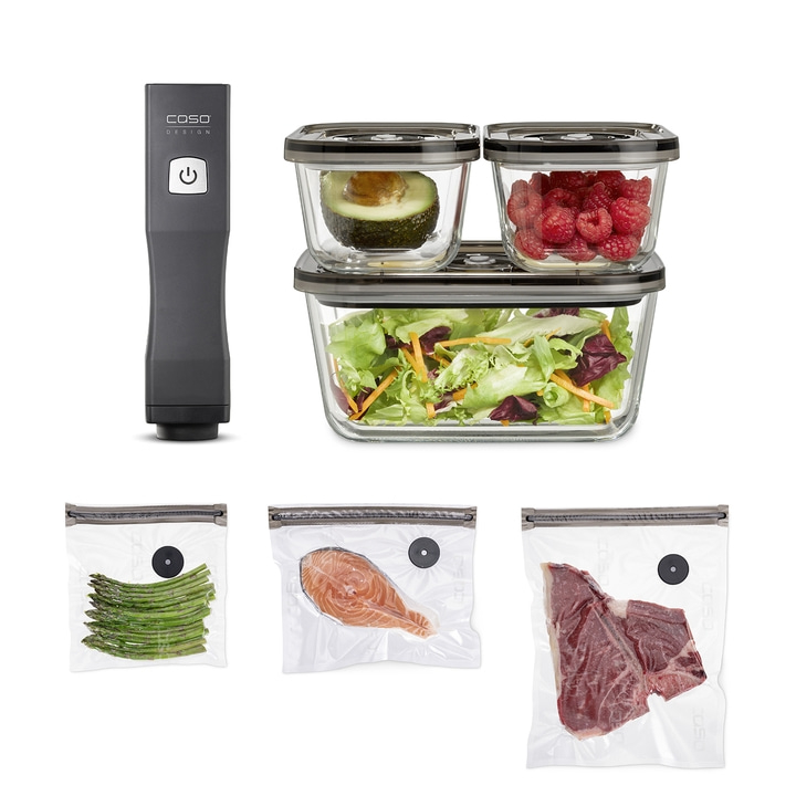 Vacuum sealer with containers and bags for food, including vegetables, avocado, raspberries, and meat.