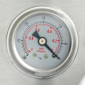 Pressure gauge reads -0.2 bar. Circular shape, silver rim, black needle, red numbers.