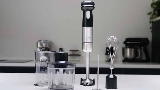 Kitchen appliance set: immersion blender, whisk, beaker, accessories, kitchen, white background