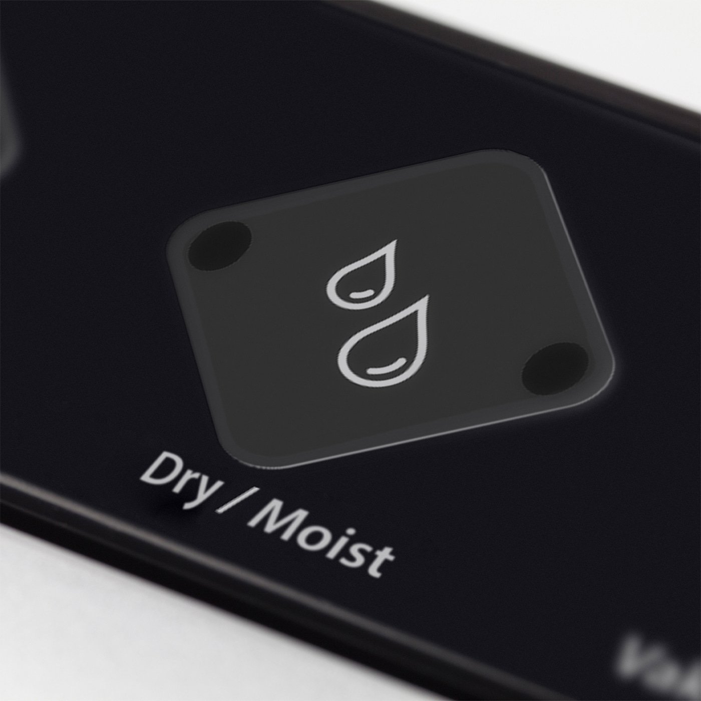 Moisture indicator with droplet symbol on black background, Dry/Moist label