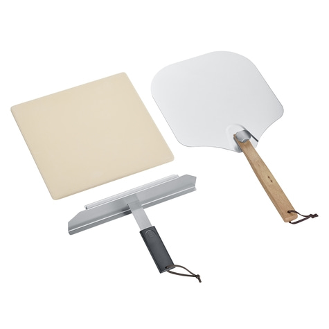 Pizza accessories: pizza stone, pizza peel, and dough cutter on white background