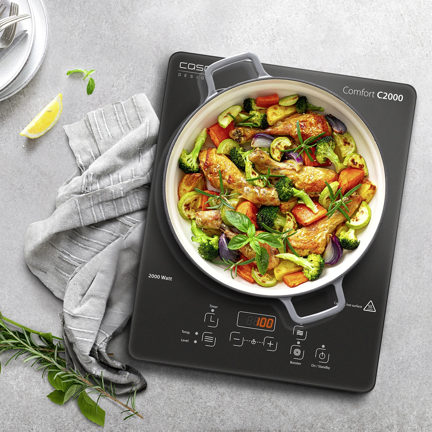 Induction cooktop with vegetables and chicken, Comfort C2000, 2000 Watt, food