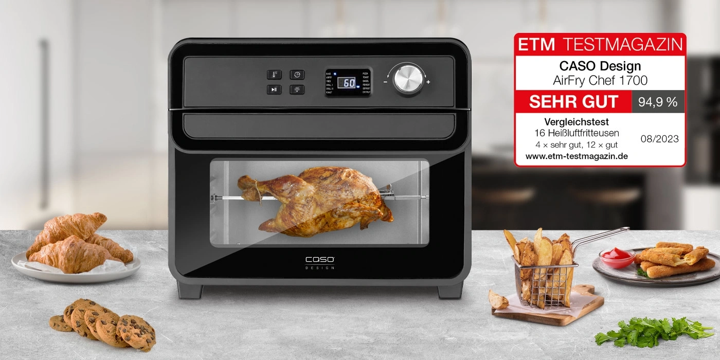 Air fryer with chicken, croissants, cookies, fries, and ETM Testmagazin rating