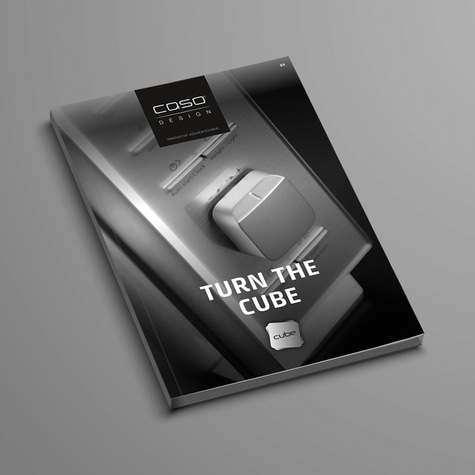Werbebroschüre mit dem Titel 'TURN THE CUBE' und dem Logo von Caso Design.