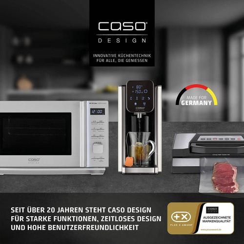 Caso Design Mikrowelle, Wasserkocher und Vakuumierer mit Fleisch.