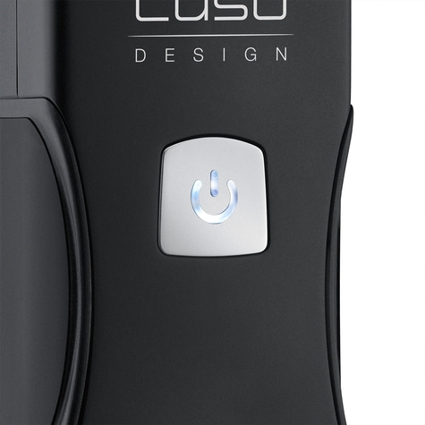 Black device with power button and blue light, design lettering on top.