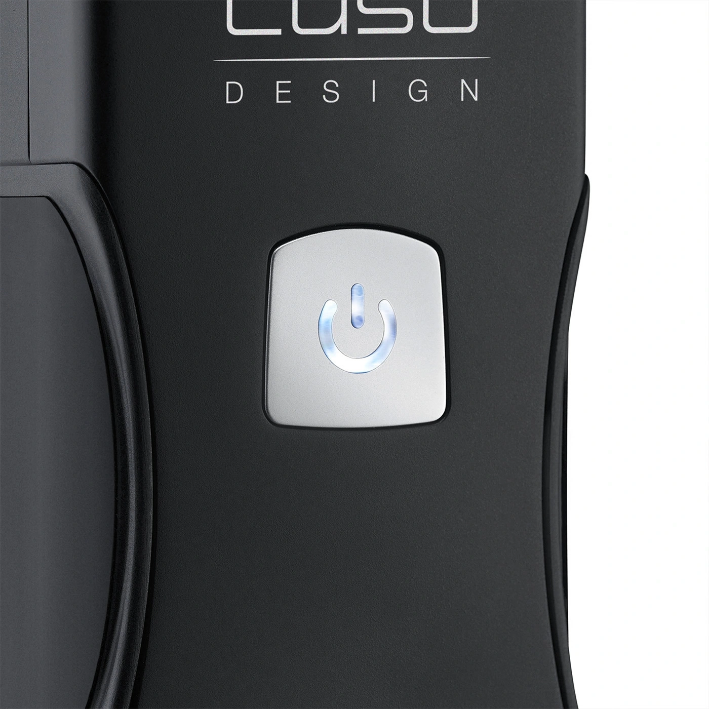 Black device with power button and blue light, design lettering on top.