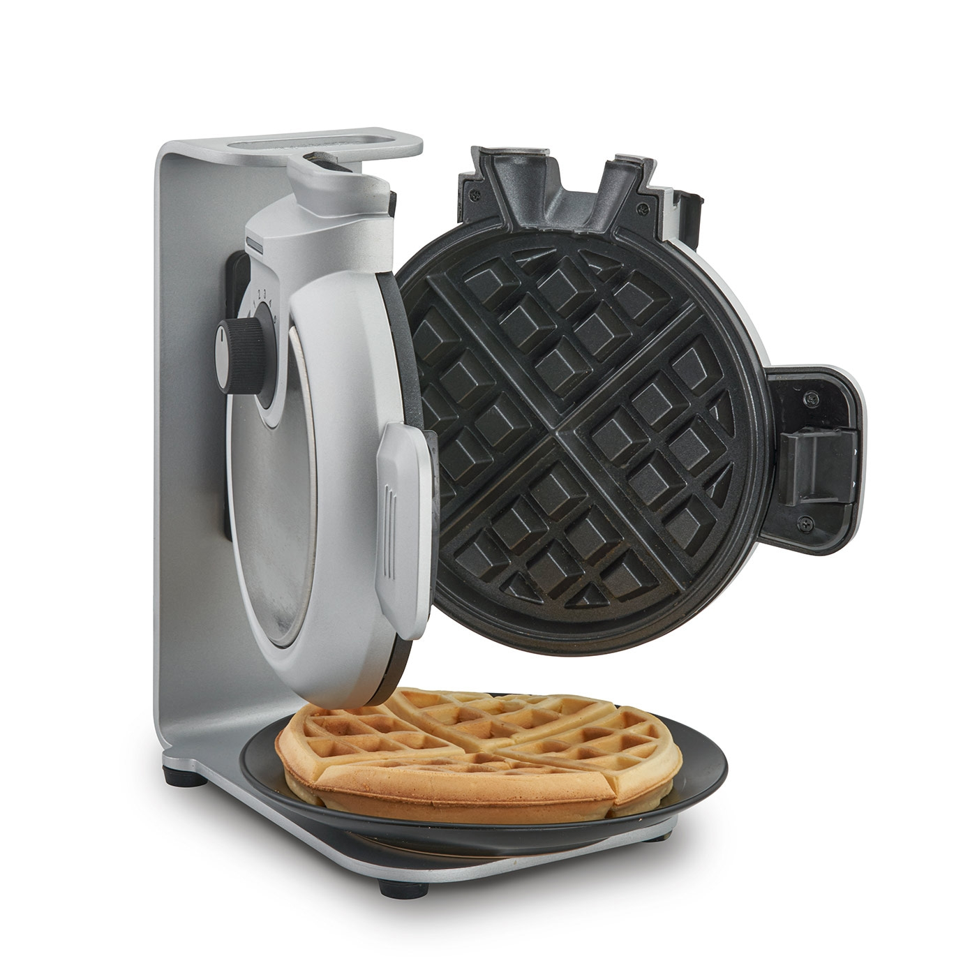 Waffle iron with waffle on a plate, ready to serve. Gray color.